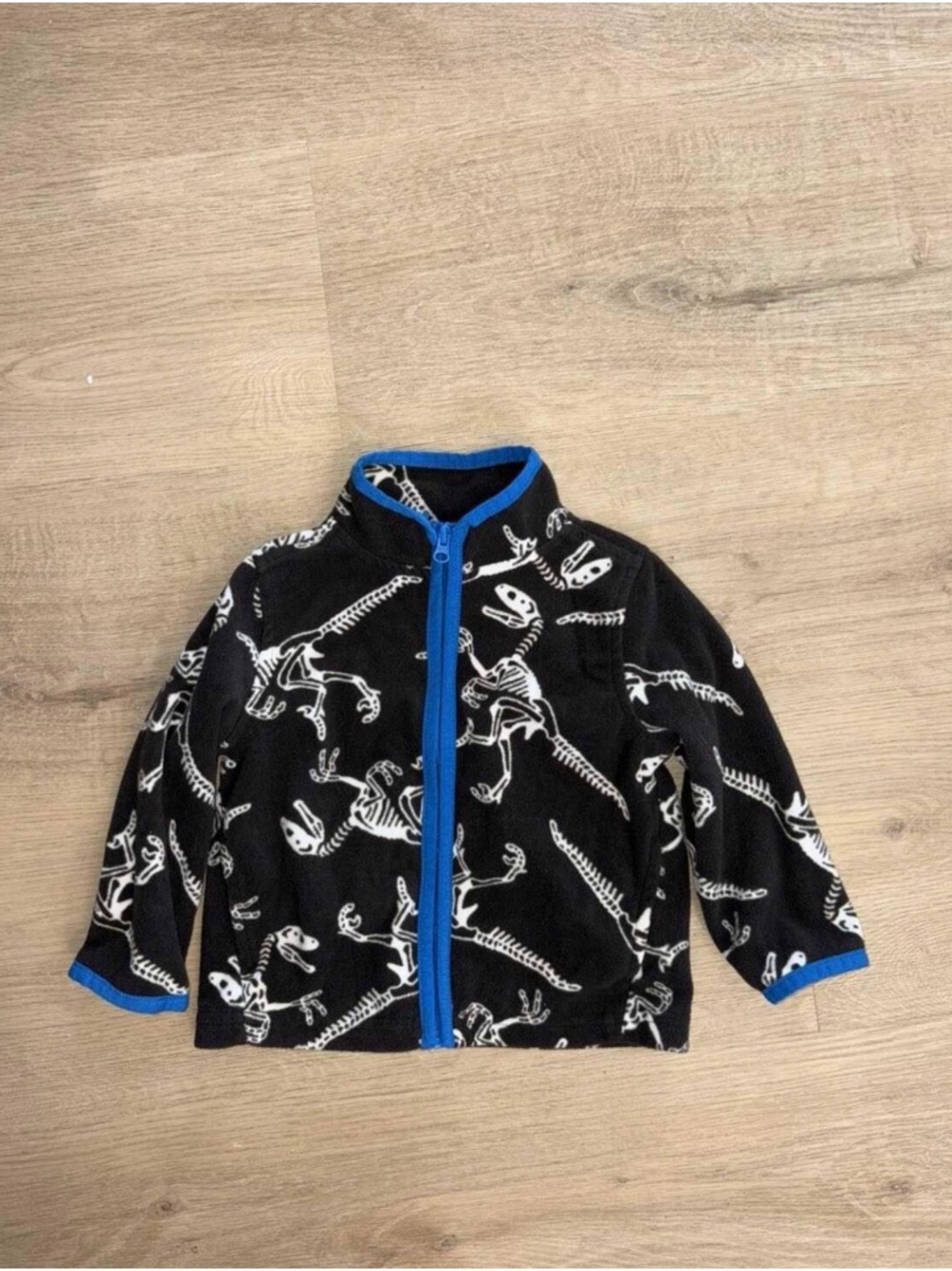 OshKosh B'gosh Black Fleece Jacket with Blue Trim and White Dino Skeleton Print